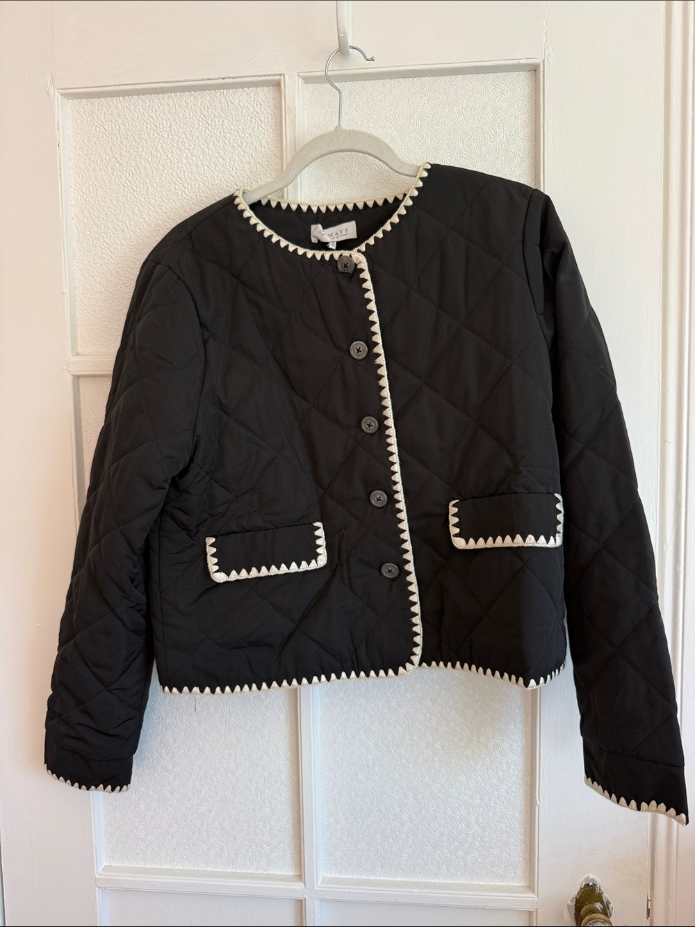 Quilted Black Jacket with Cream Trim